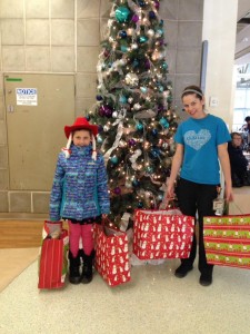 Meeting with the child life specialist before sending her stuffies off to their new friends.